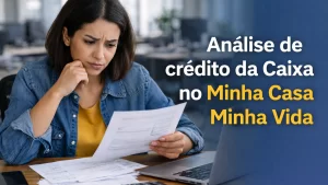 Análise de crédito da Caixa no Minha Casa Minha Vida realizada por analista em ambiente corporativo.